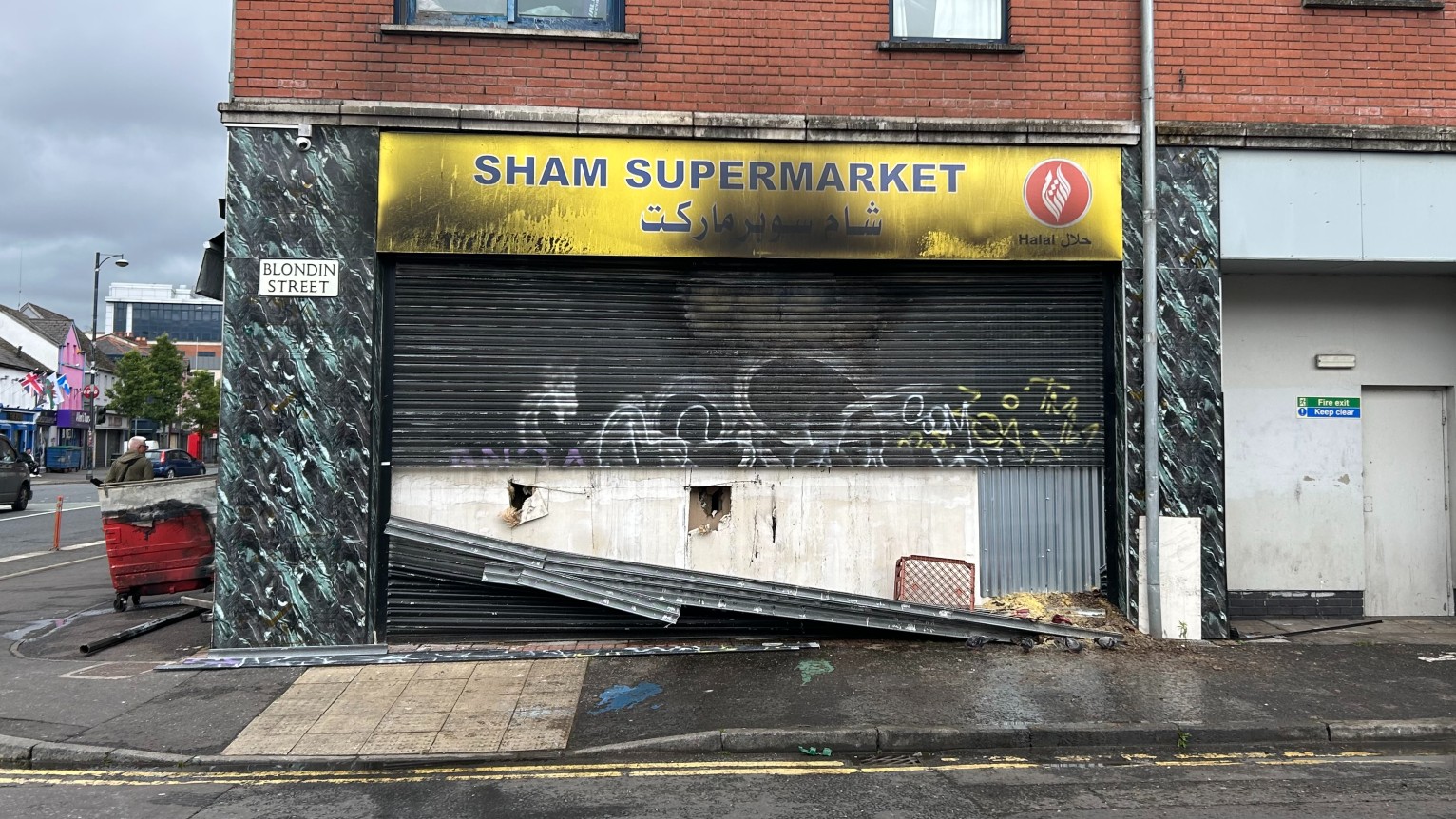 We knew it was coming: Belfast violence leaves Syrian supermarket in ruins