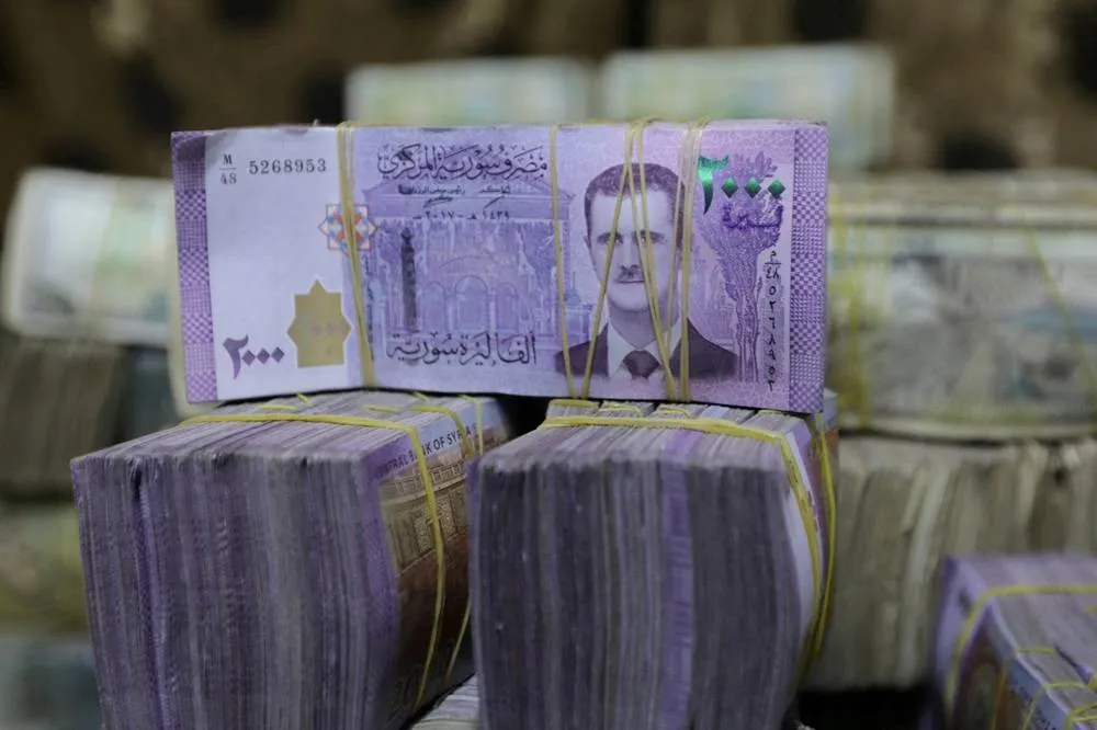 Report: Syria Plans to Print Currency in UAE and Germany Ending Russian Role020 Report: Syria Plans to Print Currency in UAE and Germany Ending Russian Role